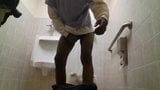 hot black guy with big cock jacks off in public bathroom snapshot 3