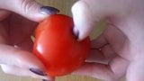 slicing tomato with nails snapshot 2