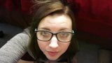 Geek girl in glasses taking facial snapshot 1