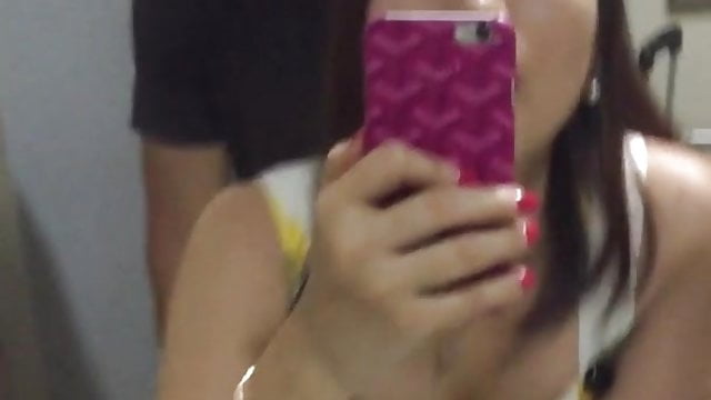 A sultry spouse gets intimate in an open restroom.