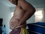 Cute Latino enjoys his new belly snapshot 10