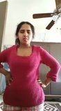 Indian Milf showing her boobs and undressing snapshot 2