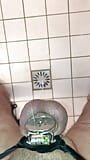 Shower pissing in micro chastity cage with penis plug POV snapshot 1