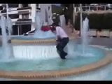 Marjorie is getting wet in a public fountain - outdoor snapshot 5