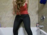 Chubby girl pees wearing jeans in shower snapshot 7