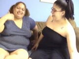 Two fat girls enjoy some fine dining in by sucking on tits and pussies snapshot 2