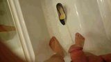 Pissing into wife's black pumps at a hotel room tub snapshot 3