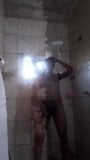 naked brunette taking a shower snapshot 1