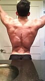 Jacked bodybuilder Benji Bastian flexing his huge, shredded, muscles snapshot 4