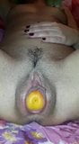 Russian whore is pushing a peach out of her juicy pussy snapshot 4