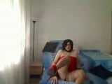 Milf trans lady en vestido rojo y tacones rojos habla con voz sexy y se toca snapshot 10