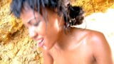 Ebony babe Noemilk experiences a pretty kinky beach fuck snapshot 20