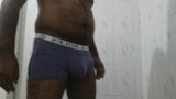 An Asian black boy pissing in his underwear snapshot 2