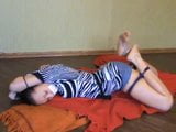 tied girl struggling snapshot 1