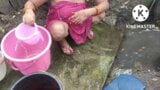 Indian house wife bathing outside snapshot 5