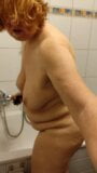 Fat and saggy housewife is cleaning the tub snapshot 6