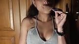 Fumando y extendiendo humo en mis tetas y culo, y chupando helado snapshot 15