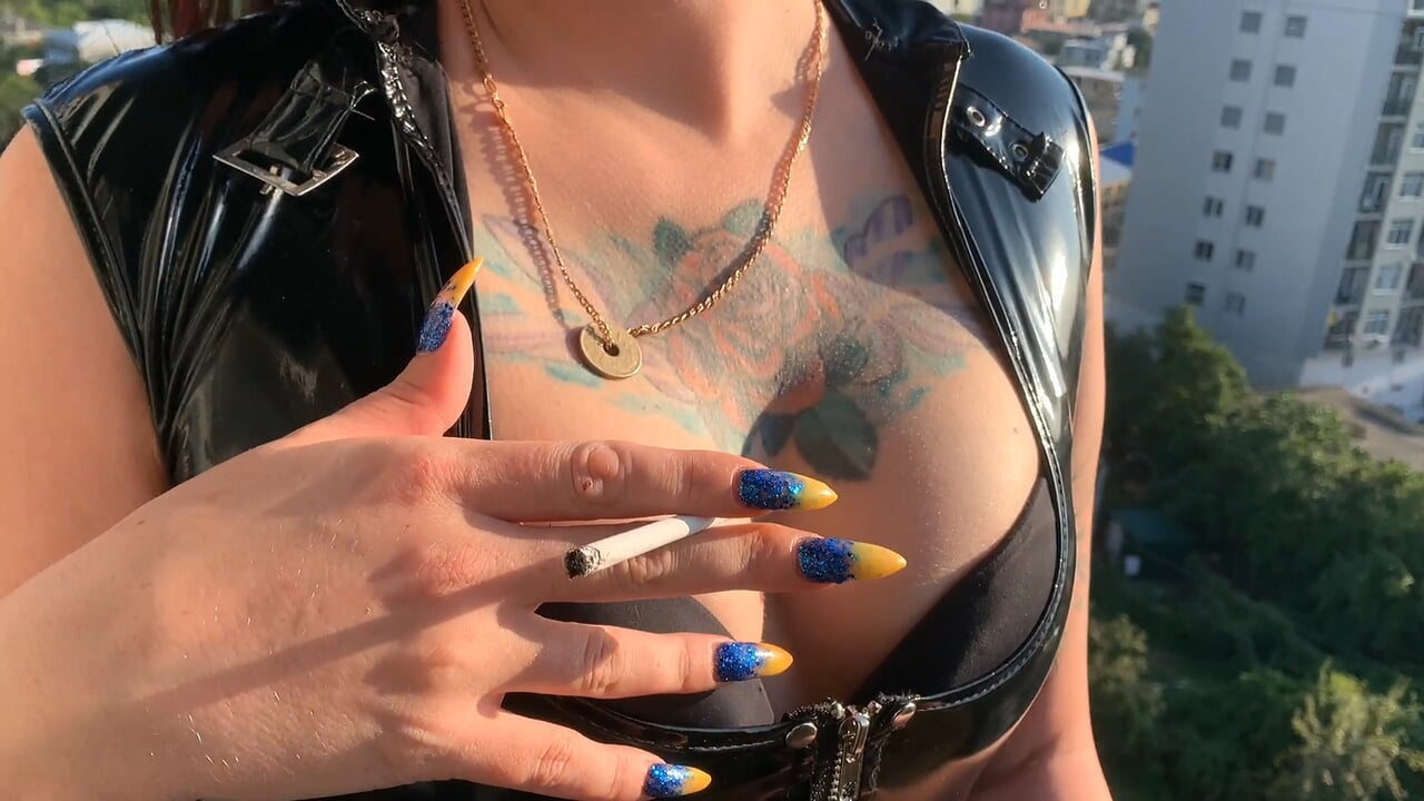 Dominatrix Nika seduces you and smokes a cigarette sexually in front of the...