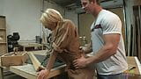 Inside the workshop the blonde milf with big tits bounces her shaved pussy in reverse cowgirl snapshot 1