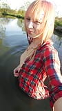 Swimming in jeans and shirt in river. snapshot 6