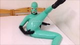 Jade and black rubber doll in total latex enclosure snapshot 8