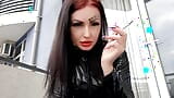 Cigarette smoke. Smoking fetish. Dominatrix Nika smokes 2 cigarettes on the balcony. Smoke fetish and smoking mistress snapshot 3