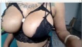 this tatted ebony is shaking her big ass and big tits on cam snapshot 2