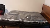 Aug 24 2023 - VacPacked with my PVC aprons, silver latex jacket and thick quilt snapshot 2