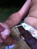 Public Jerking off shirtless on the park bench and cumming on my shorts. snapshot 9