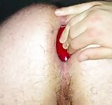 Huge red butt plug fully inside my gaping hole snapshot 4