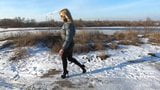 Blonde MILF walking in shiny leggings and puffer jacket snapshot 7