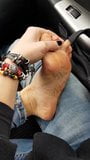 Foot rub in the road. Feet in the car. Foot fetish video snapshot 1