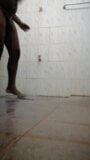 A horny Black Asian guy pissing in underwear and bathing in bathroom snapshot 9