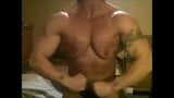 Musclewoman topless flexing webcam snapshot 1