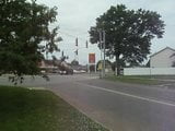 1992 gillig bus going through city in evansville,indiana snapshot 2