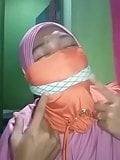 Self gagging Indonesian with mask snapshot 6