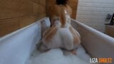 Fit teen plays in bubble bath. snapshot 5