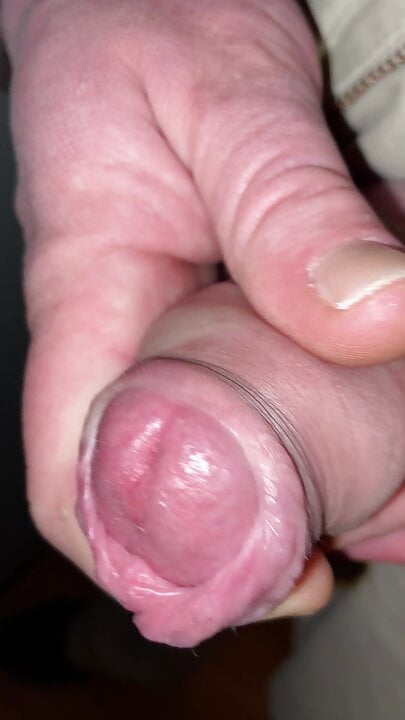 Close up edging tight foreskin with big cockhead