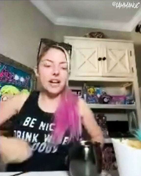 WWE - Alexa Bliss taking off her shirt