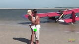 Passionate fucking on the beach with a stunning blonde with big tits snapshot 4