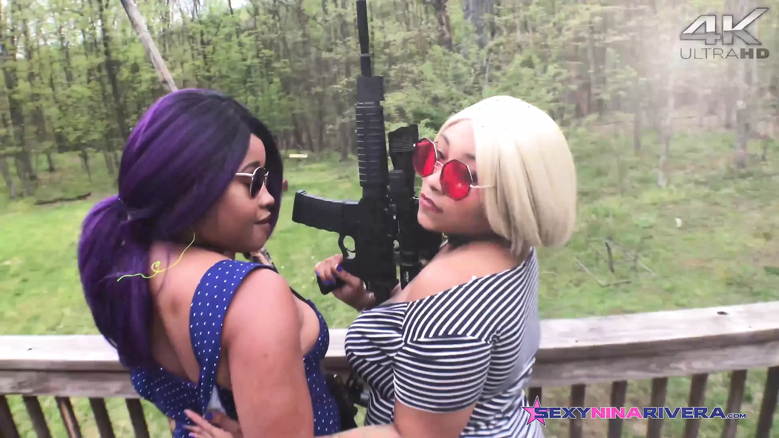 Layla Red dominates Nina Rivera 's pussy in the backyard with her strapon