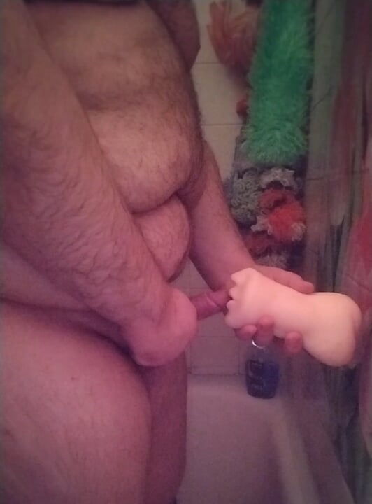 The chubby bear fucking rough a fleshlight in all 3 holes