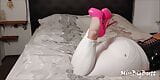 BWB MissBigButt wearing her high heel collection with white freddy leather pants and black latex corsage in bed snapshot 7