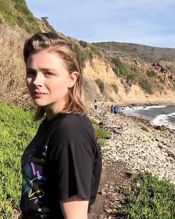 Chloe Grace Moretz walking in tight pants.