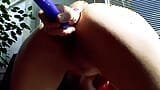 A slim blonde teen from Germany masturbating with a candle snapshot 17