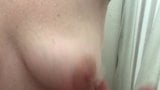 Playing with her beautiful saggy tits while she washes.  snapshot 10