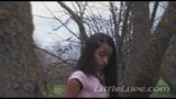 Little Lupe masturbates her tight pussy in the woods snapshot 2