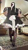 In a black and white maid outfit snapshot 1