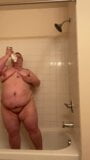 showing fat belly in shower snapshot 1