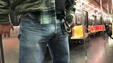 Sehr männliche Arbeiterin in der U-Bahn snapshot 1